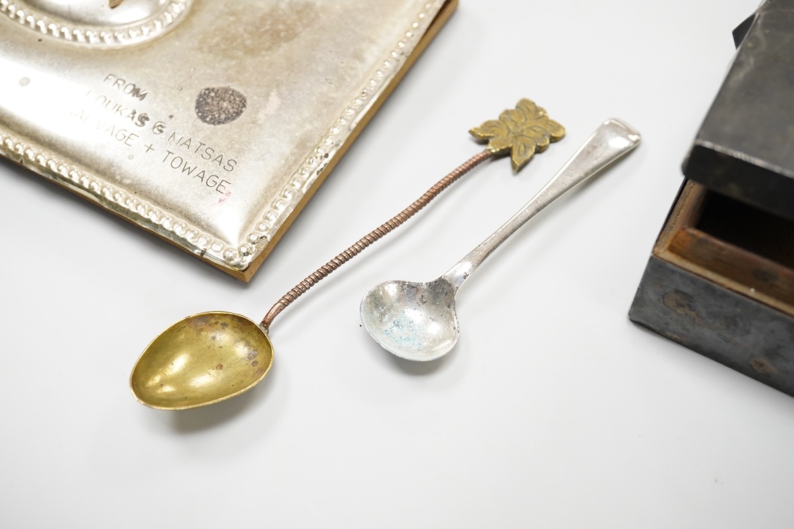 A collection of silver and white metal items, to include a cigarette box, a/f, a German dwarf candlestick, a cased spoon and pusher, etc.